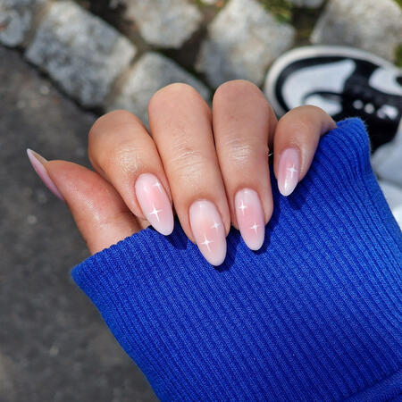 Nails with glitter ombre and charms, design