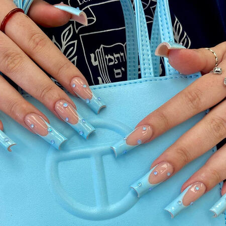 blue french nails with swarovski stone